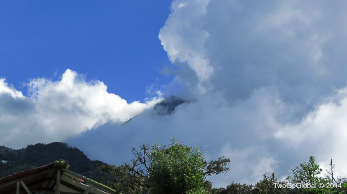 Tungurahua trying to peer through the clouds