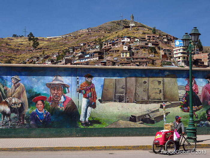 Pachacutec high up on the hill, a wall mural and an ice-cream seller