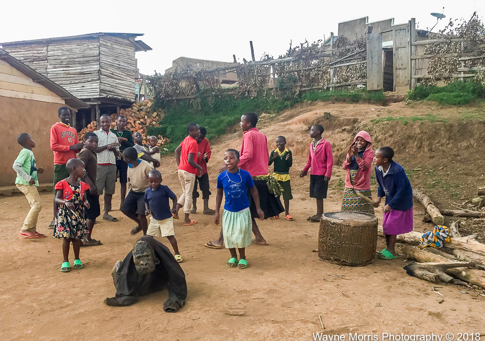 Children performing a song and dance for us